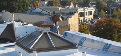 roofer_working_ridgeline_roofing_co